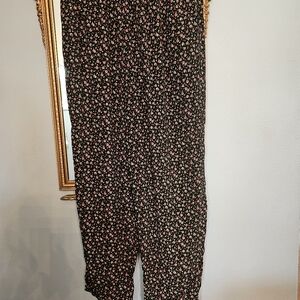 Black pants red floral print